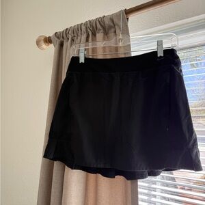 Nike Dri-Fit black skort, size small.